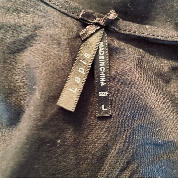 Black midi length summer dress with unique detail - Picture 3 of 4